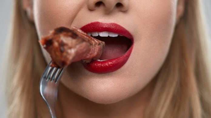 woman-eating-steak.jpg