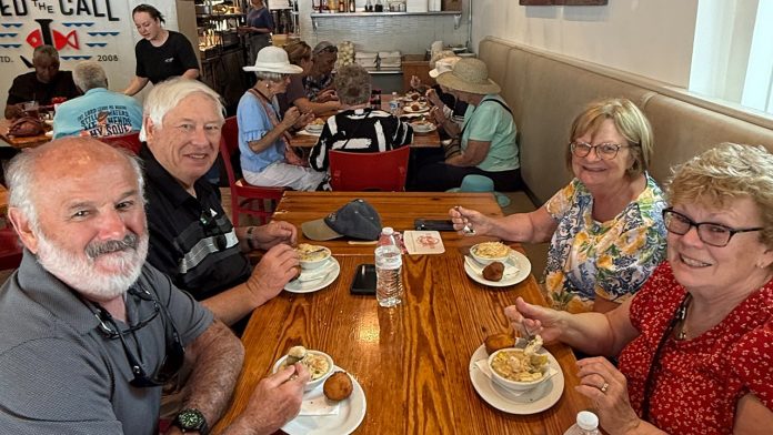 taste-of-thomasville-food-tour-group-eats-at-restaurant.jpg